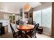 Inviting dining area with views to the deck at 8129 Locust Dr, Littleton, CO 80125