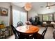 Comfortable dining area open to living room and great natural light at 8129 Locust Dr, Littleton, CO 80125
