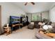 Cozy living room with large window and comfortable seating at 8129 Locust Dr, Littleton, CO 80125