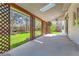 Relaxing covered patio that offers a peaceful outdoor space for dining and enjoying the well-manicured backyard at 5305 W Lake Pl, Littleton, CO 80123