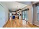 Spacious open-concept kitchen, with island, leads to the dining and Gathering room at 5305 W Lake Pl, Littleton, CO 80123