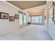 Open-concept living room with natural light, neutral walls, and hardwood floors offers a spacious area at 5305 W Lake Pl, Littleton, CO 80123