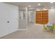 Spacious basement area with built in bookcase, colorful table and recessed lighting at 6488 Tilbury Ave, Firestone, CO 80504