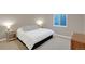 Bedroom with carpeted floors, a window, and neutral colored walls at 6488 Tilbury Ave, Firestone, CO 80504
