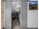 Spacious walk-in closet with light walls and dark trim and custom shelving at 1053 S Washington St, Denver, CO 80209