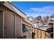 Balcony view overlooking parking and buildings with a blue sky backdrop at 13782 E Lehigh Ave # B, Aurora, CO 80014