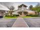 Charming exterior with brick accents, lush landscaping, and a inviting entryway at 13782 E Lehigh Ave # B, Aurora, CO 80014
