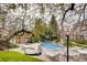 Outdoor pool area with inviting lounge chairs and lush landscaping creating a relaxing oasis at 13782 E Lehigh Ave # B, Aurora, CO 80014