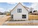 Charming two-story home with white siding, black window trim, and modern landscaping at 3890 N Cook St, Denver, CO 80205