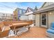 Deck with built-in bench seating and a wooden table at 1342 Lipan St, Denver, CO 80204