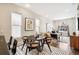 Modern dining area with a round table and black chairs at 1342 Lipan St, Denver, CO 80204