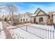 Street view of charming house in snowy neighborhood at 1342 Lipan St, Denver, CO 80204