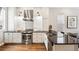 Modern kitchen with stainless steel appliances and white cabinets at 1342 Lipan St, Denver, CO 80204