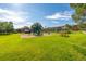 Community park area with picnic tables and playground at 9042 E Lehigh Ave, Denver, CO 80237