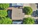 Aerial view of the home and yard showcasing the roof, patio and surrounding greenery at 293 Wagonwheel Dr, Fort Lupton, CO 80621