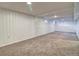 Spacious finished basement with recessed lighting and neutral carpet at 8418 Ames, Arvada, CO 80003