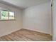 Light and bright bedroom featuring new flooring, neutral walls, and modern design at 8418 Ames, Arvada, CO 80003