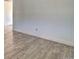 Open living room with new flooring and contemporary design at 8418 Ames, Arvada, CO 80003