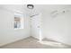 Bedroom features a window for ample natural light and a large closet at 2295 S Sherman St, Denver, CO 80210