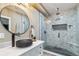 Stylish bathroom featuring a modern sink, countertop, walk-in shower and beautiful tile design at 39200 E 148Th Ct, Keenesburg, CO 80643