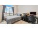Cozy bedroom features a large window with mountain views and modern decor at 39200 E 148Th Ct, Keenesburg, CO 80643