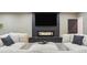 Modern fireplace with a sleek design, set beneath a mounted television at 39200 E 148Th Ct, Keenesburg, CO 80643
