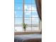 Bright view from the bedroom window with a plant on the ledge at 39200 E 148Th Ct, Keenesburg, CO 80643