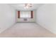 Bright bedroom with carpet, ceiling fan and window letting in lots of natural light at 620 S Alton Way # 5B, Denver, CO 80247