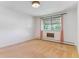 Bright bedroom with carpet and large window allowing for lots of natural light at 620 S Alton Way # 5B, Denver, CO 80247