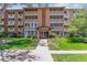 Well-maintained building with manicured lawn and inviting entrance perfect for comfortable living in this desirable neighborhood at 620 S Alton Way # 5B, Denver, CO 80247