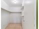Walk-in closet with built-in shelving and ample storage space, providing organization at 620 S Alton Way # 5B, Denver, CO 80247