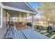 Backyard featuring a deck under construction, a gray facade, and a fenced in yard at 5490 S Jellison St, Littleton, CO 80123