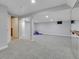 Spacious carpeted basement with ample room for activities and storage space at 12362 E Vassar Dr, Aurora, CO 80014