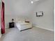 Spacious bedroom with soft carpet, neutral walls, and plenty of room for furnishings at 12362 E Vassar Dr, Aurora, CO 80014