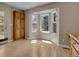 Bright breakfast nook is enhanced by large windows and an abundance of natural light at 12362 E Vassar Dr, Aurora, CO 80014