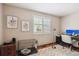Bright home office with natural light, built-in storage, and modern desk at 6836 Edgewood Way, Highlands Ranch, CO 80130