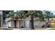 Charming home exterior featuring mature landscaping and a welcoming entrance at 11153 W 17Th Ave # 101, Lakewood, CO 80215