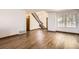 Expansive living room offering wood floors, neutral walls, and easy access to upper levels at 11153 W 17Th Ave # 101, Lakewood, CO 80215