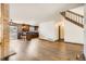 Bright living space showcasing hardwood floors and an open layout connecting to the kitchen at 11153 W 17Th Ave # 101, Lakewood, CO 80215