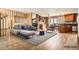 Inviting living room showcasing a cozy fireplace, hardwood floors, and stylish, comfortable seating at 11153 W 17Th Ave # 101, Lakewood, CO 80215