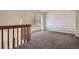 Bright open loft space with a large window and staircase at 11153 W 17Th Ave # 101, Lakewood, CO 80215