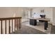 Bright office space featuring a modern desk, black leather chair, and neutral carpet at 11153 W 17Th Ave # 101, Lakewood, CO 80215