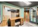 Finished office space with custom wood desk, painted walls and gray flooring at 11153 W 17Th Ave # 101, Lakewood, CO 80215