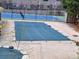 Community pool with cover and tennis courts for active living at 11153 W 17Th Ave # 101, Lakewood, CO 80215