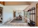 Inviting dining room featuring a bay window, wood table with seating for six, and modern decor at 1065 6Th St, Berthoud, CO 80513