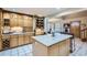 Spacious kitchen featuring ample cabinet space, granite countertops, and modern appliances at 1065 6Th St, Berthoud, CO 80513