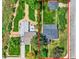 Aerial view of the home showing its layout, yard, and proximity to the street at 1901 S Adams St, Denver, CO 80210