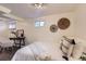 This bedroom features a clean, modern design, a desk, and plenty of natural light at 1901 S Adams St, Denver, CO 80210