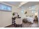 Bright bedroom features warm hardwood floors, natural light, and a modern design with neutral colors at 1901 S Adams St, Denver, CO 80210