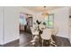Cozy dining area with a modern light fixture, perfect for intimate meals at 1901 S Adams St, Denver, CO 80210